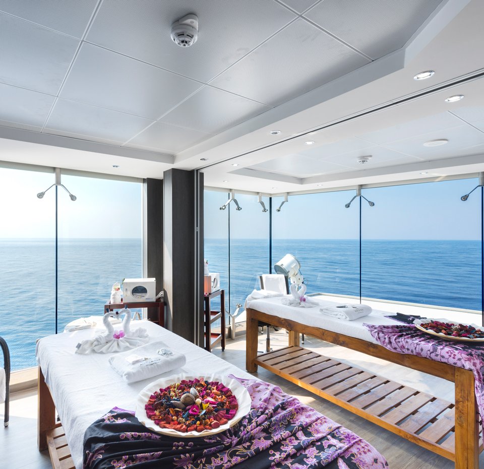 Luxury spa room with massage tables overlooking the ocean on an MSC cruise ship | MSC Cruises Luxury spa room with massage tables overlooking the ocean on an MSC cruise ship | MSC Cruises