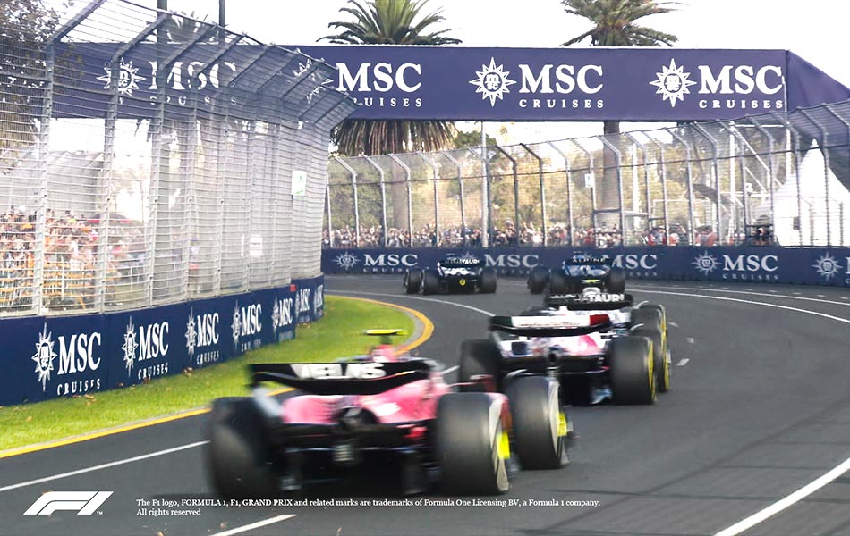Formula 1 cars racing on a track with MSC Cruises branding visible | MSC Cruises